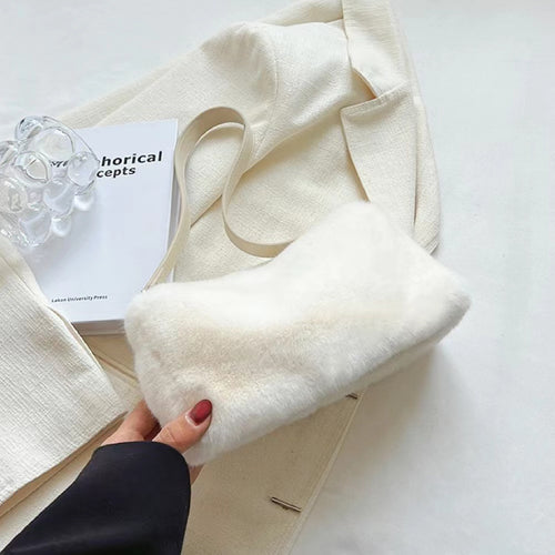 Bolso mini baguette de piel de borrego