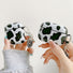 Custodia per AirPods mucca