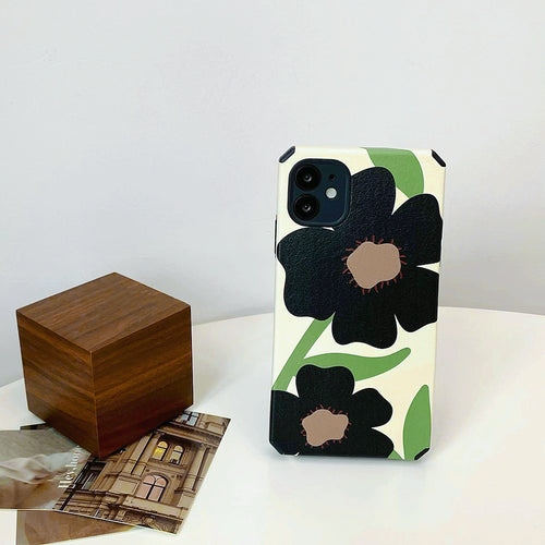 Schwarze Blumen-Telefonkasten
