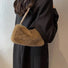 Bolso mini baguette de piel de borrego