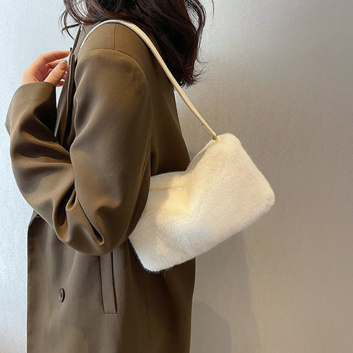 Bolso mini baguette de piel de borrego