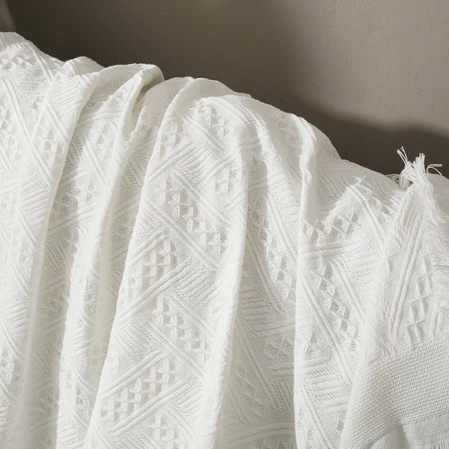 Couverture tricotée blanche
