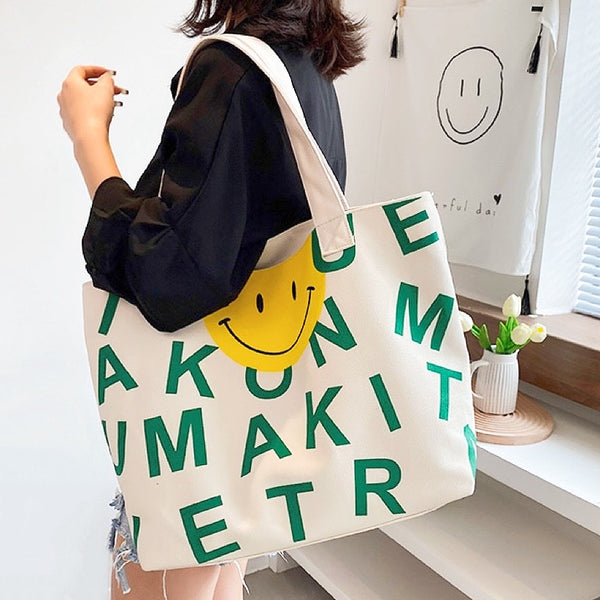 Borsa tote in tela con faccina sorridente