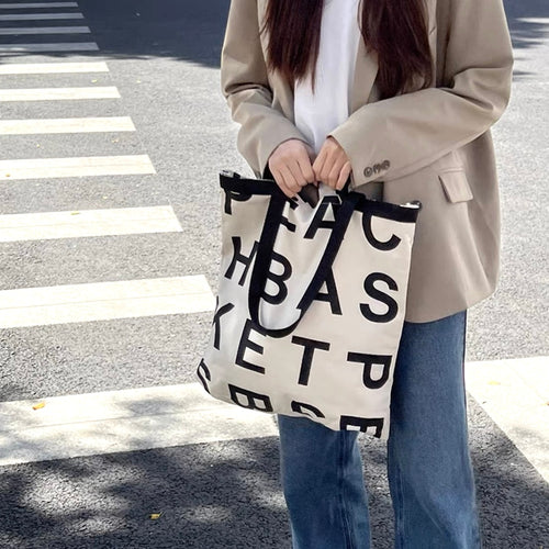 Bolso de lona con asas dobles con estampado de letras