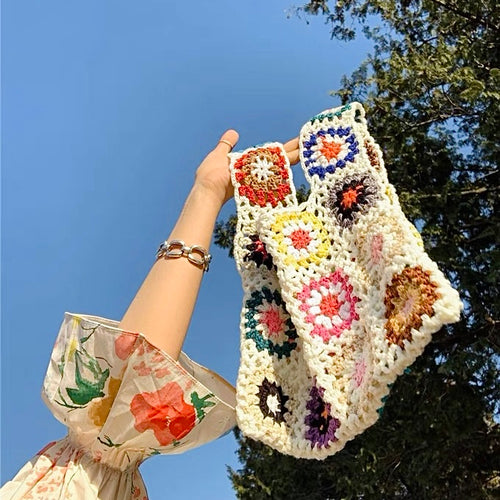 Handgemachte gehäkelte Blumengittertasche