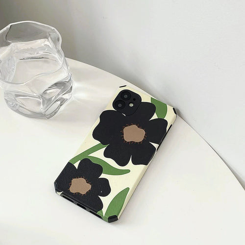 Schwarze Blumen-Telefonkasten