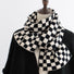 Close-up of Checkerboard Classic Scarf in black and white, great for office layering and commuting.