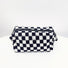 Classic black and white checkerboard knit bag; durable woven cosmetic pouch for timeless aesthetic fashion.
