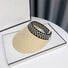 Front view of beige Checkered Band Straw Visor Hat. Foldable summer sunhat in natural straw.