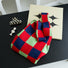 Front view of Checkered polyester tote bag with red, navy, and light green squares.