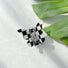 Folded view of checkered hair claw in butterfly shape , ideal for quick updos and ponytails.