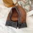 Front view of brown-grey balaclava hat with bold color-blocked panels, featuring a high-quality knit.