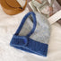 Front view of light grey-blue balaclava hat, featuring premium color-blocked panels for winter protection.
