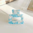 Flat lay of Color Square Hair Claw in blue, easy for workdays and special occasions.