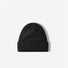 Front view of black multi-color beanie. Subtle dark flecks offer a modern twist on a classic winter staple.