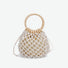 Folded view of Crochet Mini Handbag With Wooden Ring in white, easy for commuting and weekends.