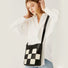 Bucket Bag aus gewebtem, kariertem Leder