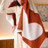 Close-up of Full Of Love bath Towel with heart pattern, showcasing the cotton fabric and heart detail.