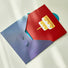 Flat lay of the Cake Birthday Card with a red cover and a printed cake.