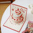Front view of 3D Layered Cake Birthday Card, great for gifting and special occasions.