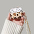Model Hands holding a Leopard Print AirPods Case Cover with pearl string, great for daily use and protection.