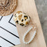 Front view of Leopard Print AirPods Case Cover with beaded strap, ideal for gifting and everyday use.