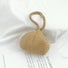 Close-up of Gold rhinestone mini diamond party handbag with a braided handle.