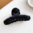 Close-up of black Plush Hair Claw, easy for workdays and special occasions.