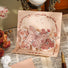 Close-up of Rose Poetry Greeting Card in butterfly pattern.