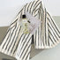 Close-up of Stripe Face Towel , showcasing the cotton fabric and strip pattern.