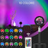 Black iron base lamp projecting a vibrant 16-color sunset/daybreak glow, with color options and remote control shown.